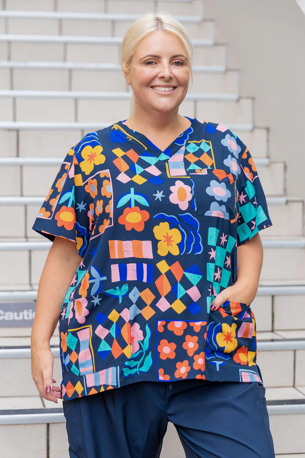 Jazz Scrubs in Checkerboard Petals Navy - Image 2