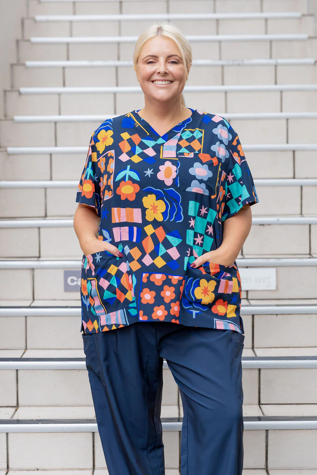Jazz Scrubs in Checkerboard Petals Navy - Image 4