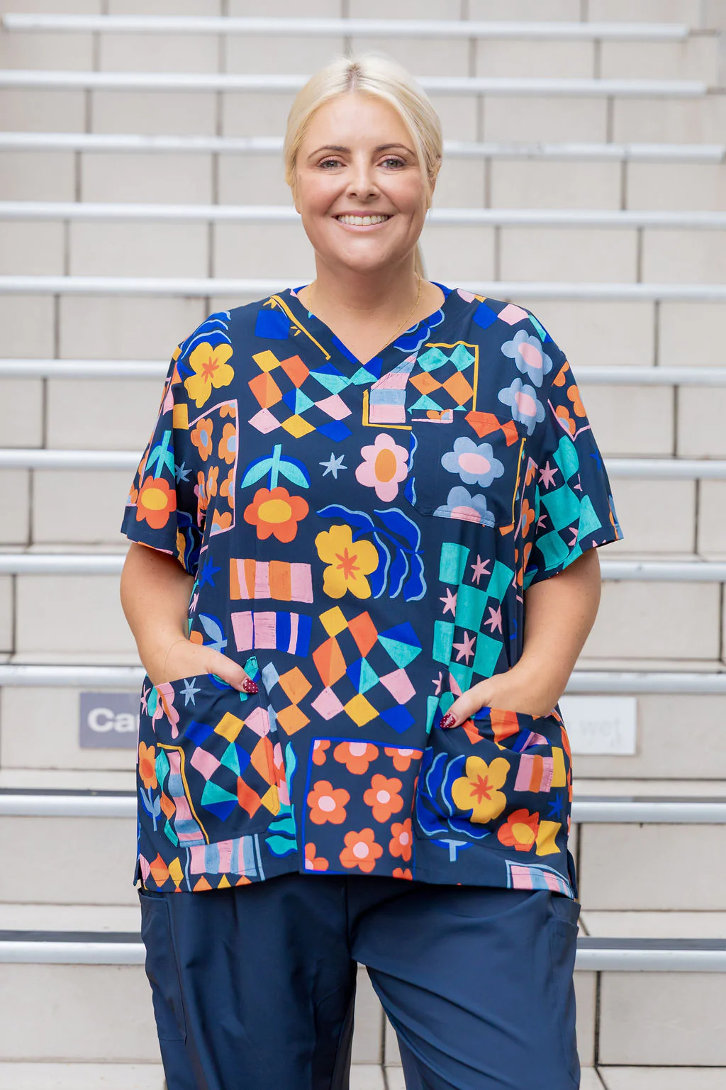 Jazz Scrubs in Checkerboard Petals Navy - Image 5