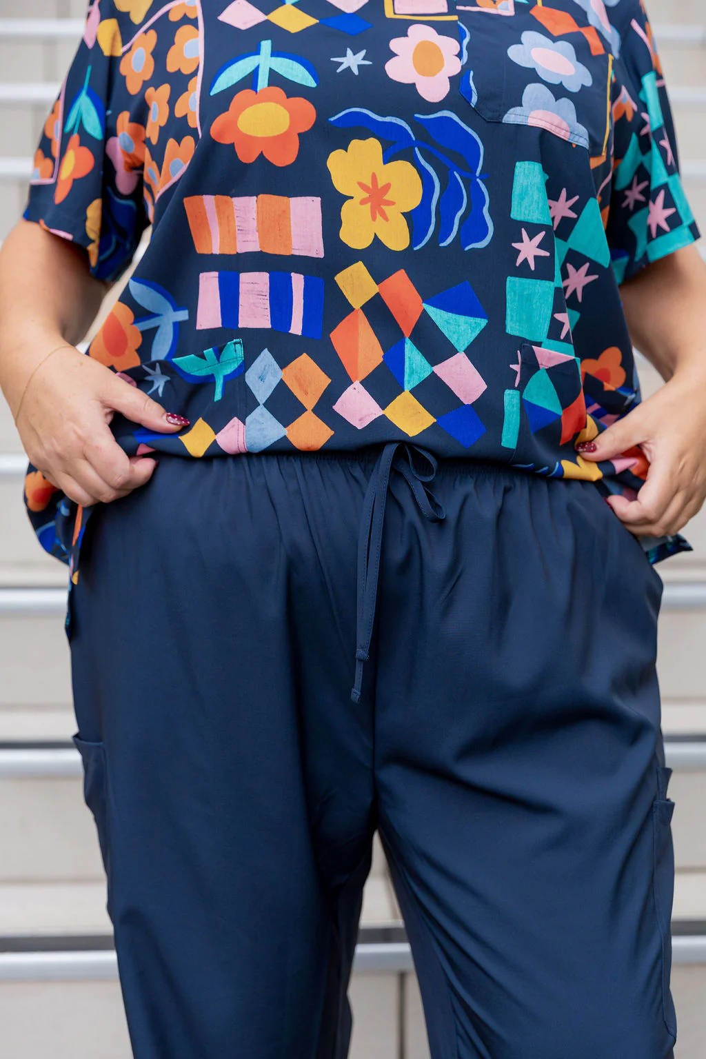 Jazz Scrubs in Checkerboard Petals Navy - Image 8