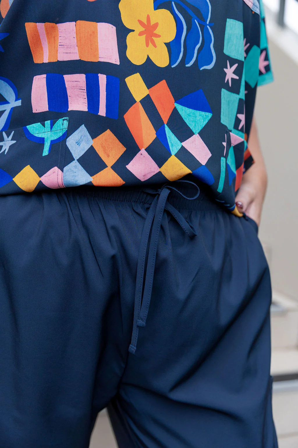 Jazz Scrubs in Checkerboard Petals Navy - Image 9