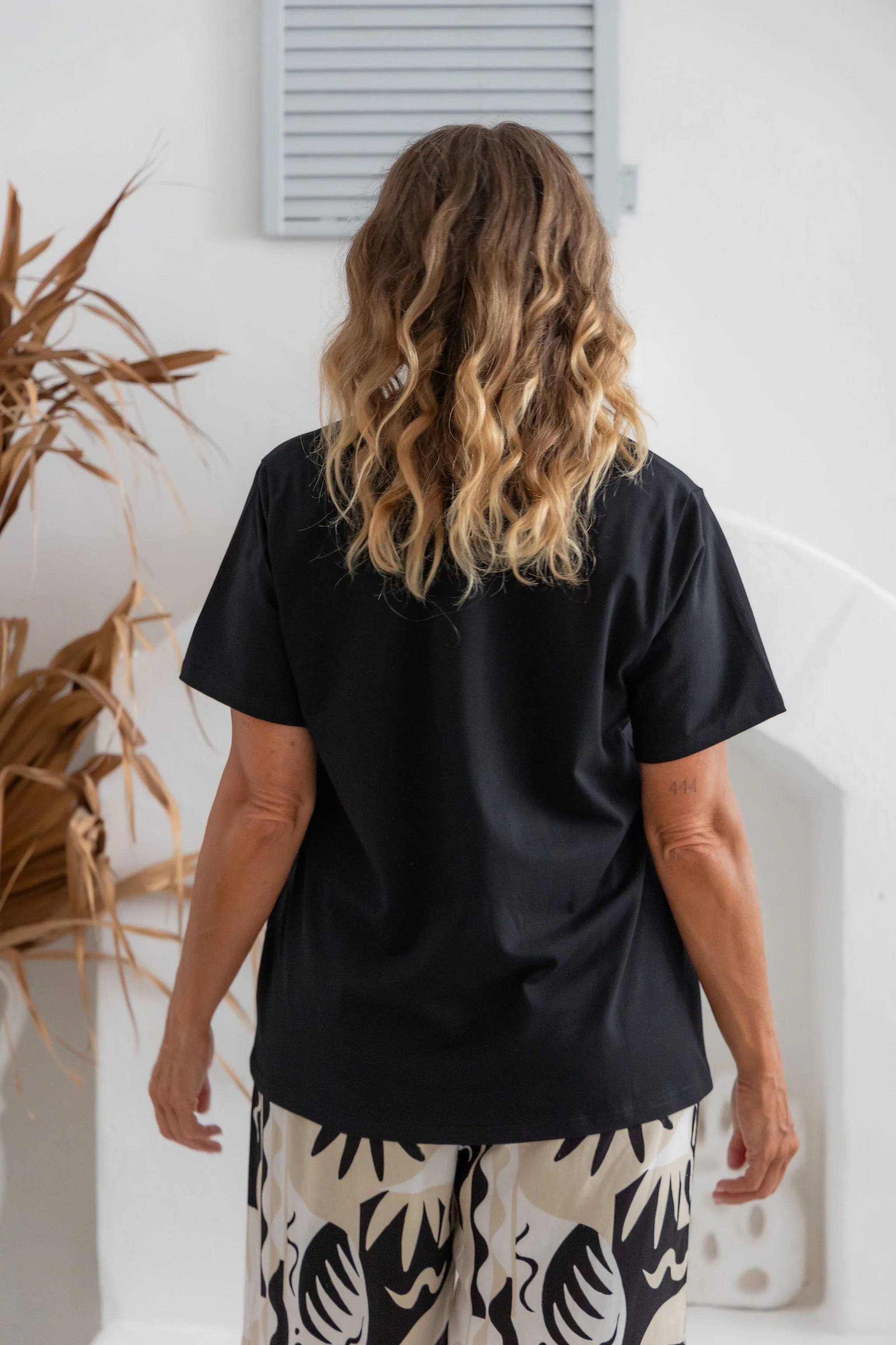 Relaxed V-Neck Tee in Black - Image 7