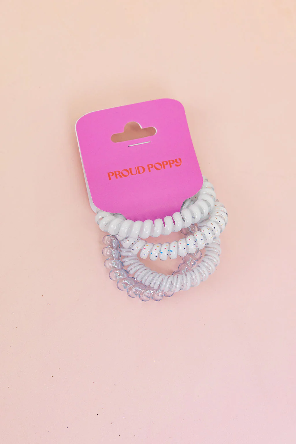 White & Clear Coil Hair Ties – 4 Pack - Image 3