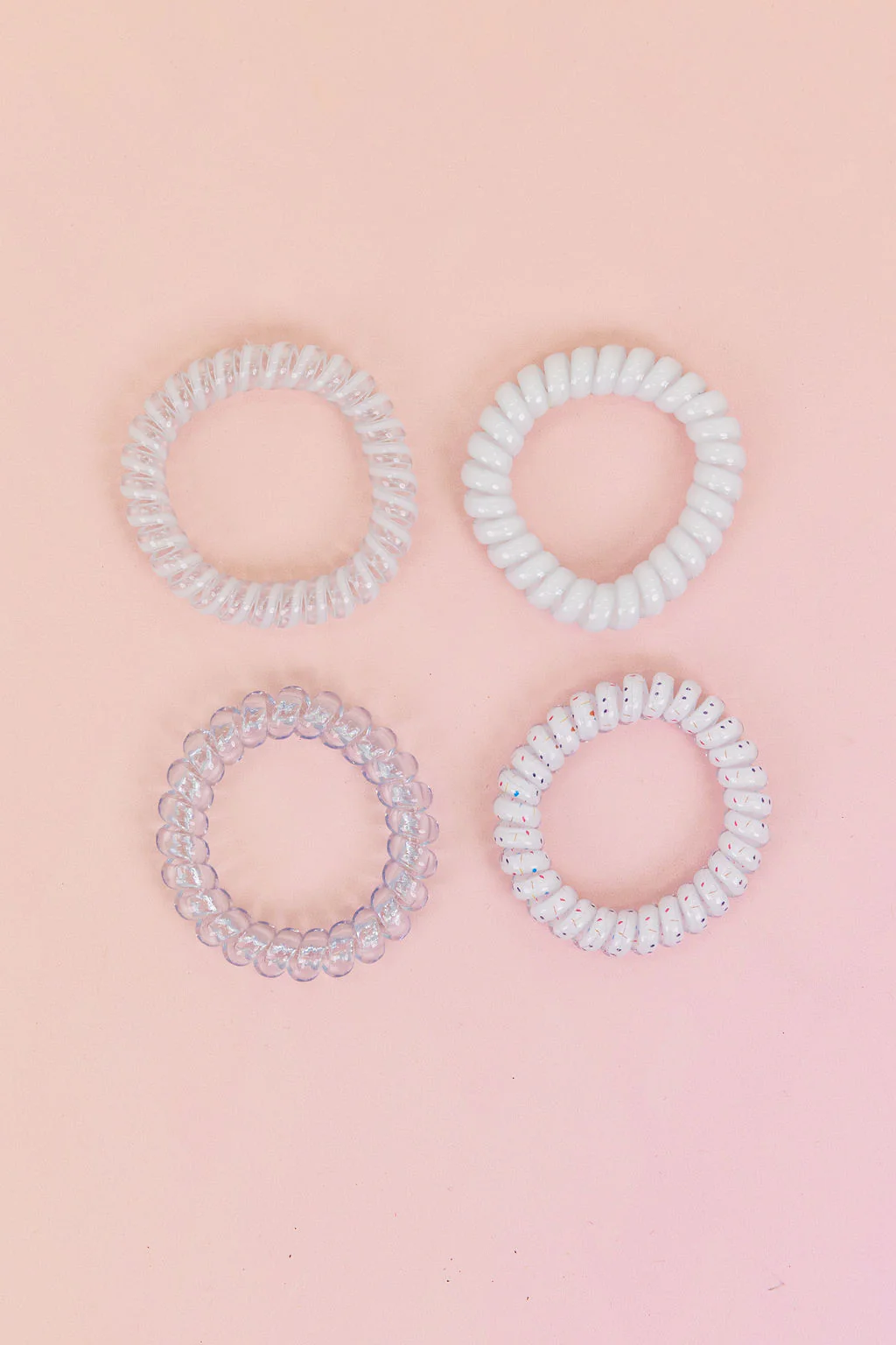 White & Clear Coil Hair Ties – 4 Pack - Image 4
